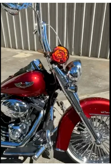 Red and chrome motorcycle in El Rey's social post
