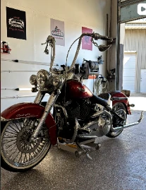 Red motorcycle in El Rey's detailing bay